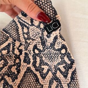 Loci Fit vcut biker shorts 
Snakeskin